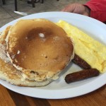 Pancakes, eggs and sausage breakfast at El Mocho Restaurant on Stock Island, Florida.